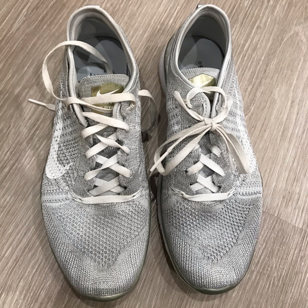 Nike white and gold sneakers